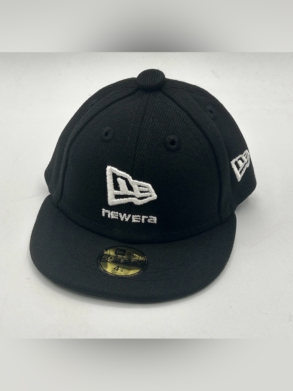NEW ERA Hat Novelty SZ 4 1/4 Black and White Mini Cap H158 Collectible